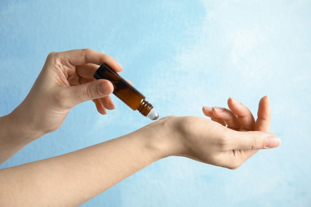 apply roll-on essential oils